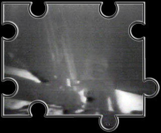 Split-Screen Film von Gary Neff der LM Kamera und der TV-Kamera an Neil's Leiter.